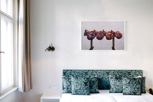 4 saddles painting print above bed